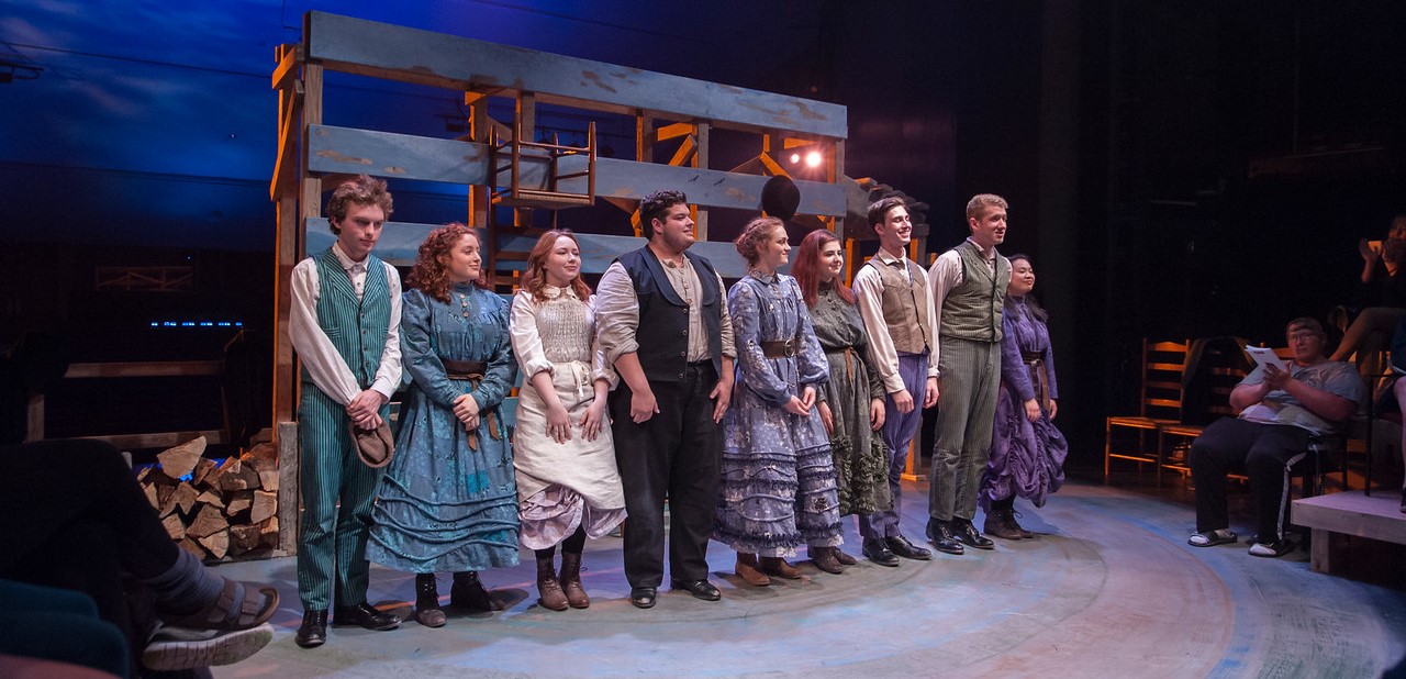 Cast of Lawrence's production of Gint, by Romulus Linney, taking a bow in Stansbury Theater